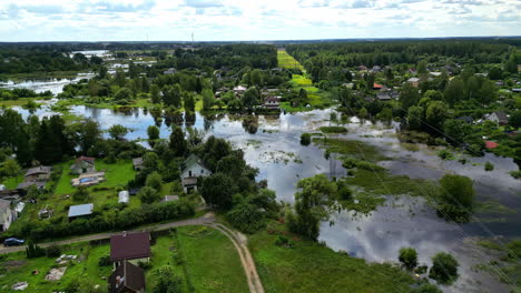wide angle panoramic view of countryside rural town rain flooded due to natural calamity. after scenes of heavy rain. aerial shot.