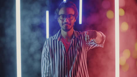 stylish man in a striped shirt with neon lights