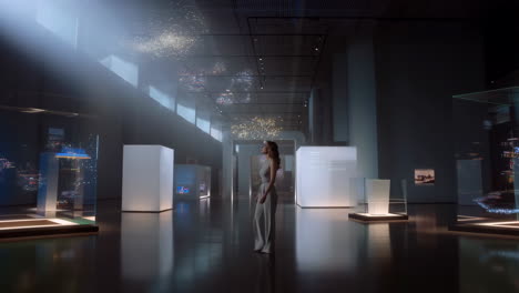 a woman exploring a modern museum or exhibition hall