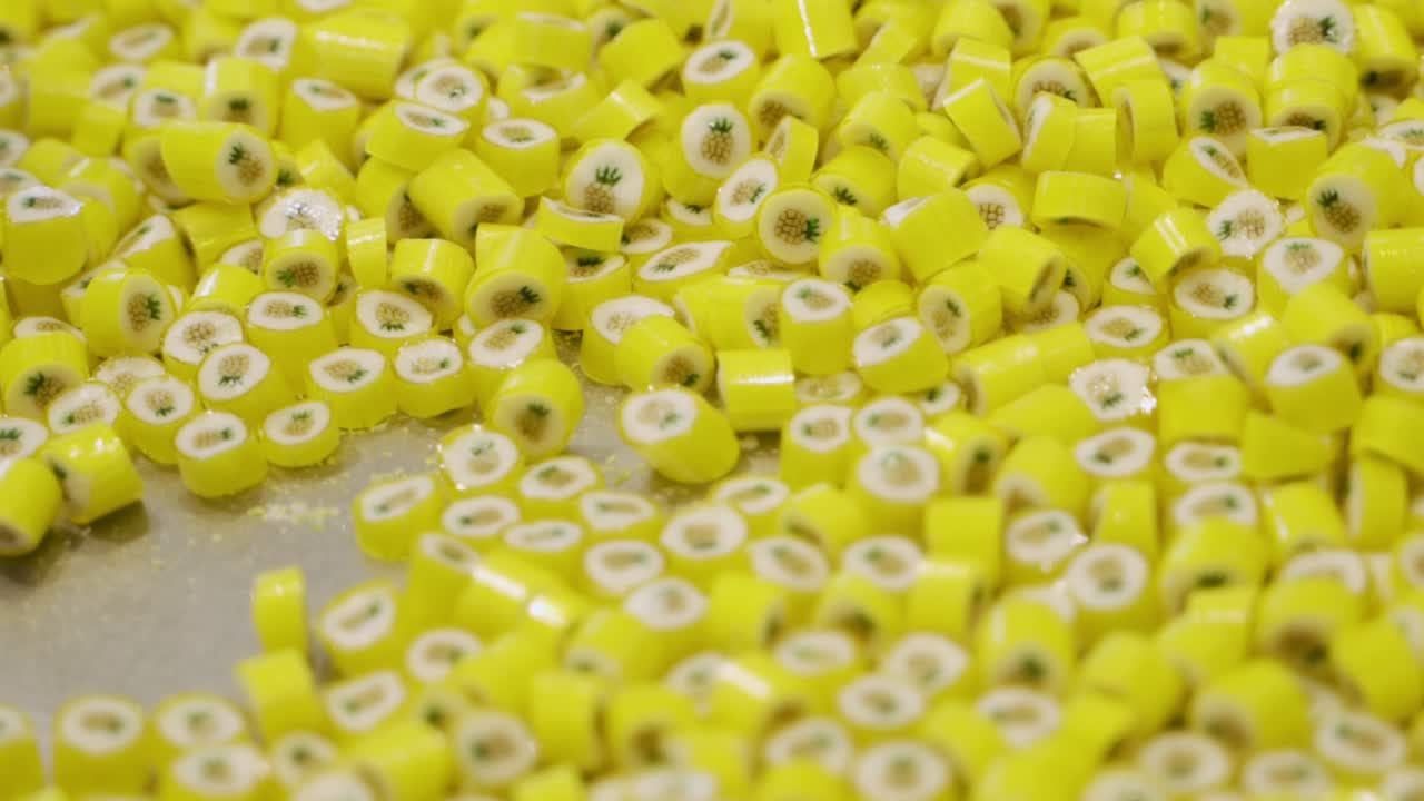 Close-up of sweet yellow caramel candies. pineapple taste.