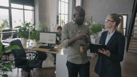 business colleagues discussing in modern office