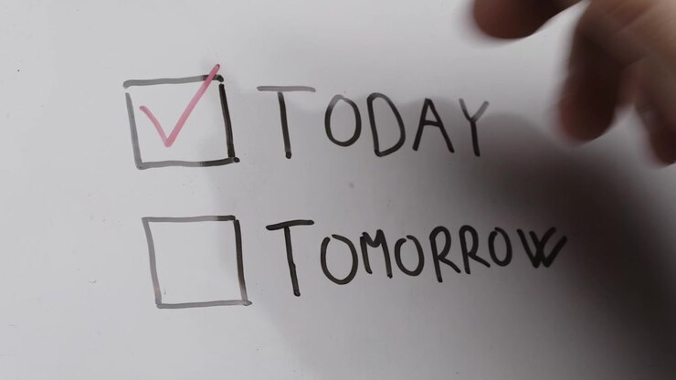 Whiteboard Checklist and Task Planning with Hand Checking Off Completed Today, Today and Tomorrow Schedule, Productivity, Organization and Time Management. Check mark