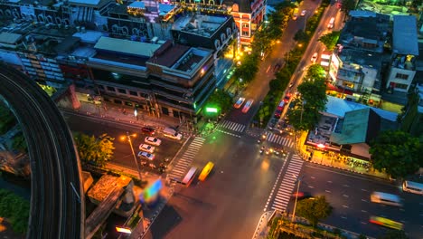 4k.time lapse traffic at intersection bangkok thailand