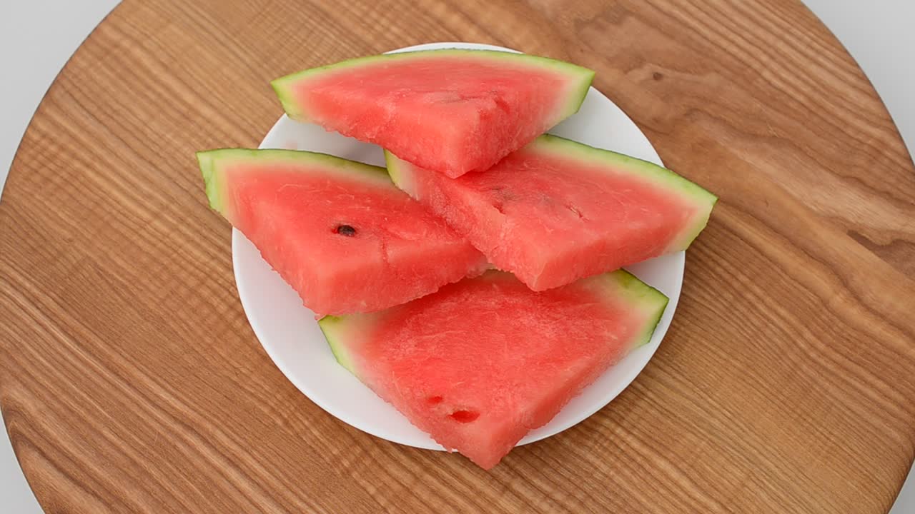 Shooting of a watermelon. Shooting in the movement
