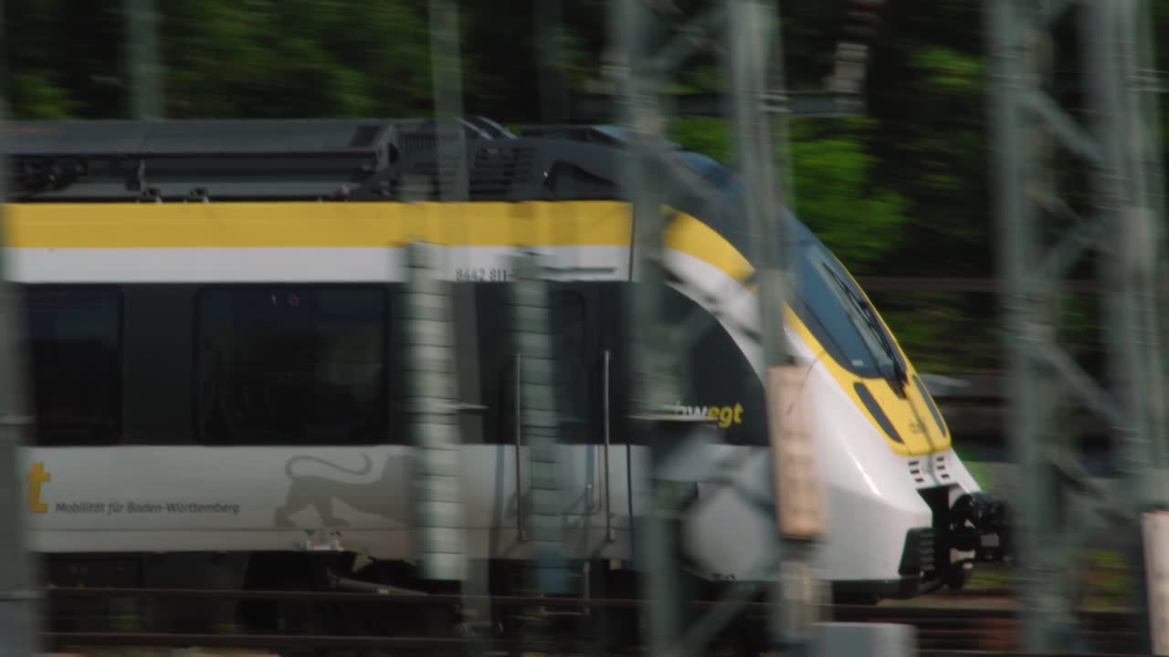 German BWegt passenger train passing by tracked by camera closeup