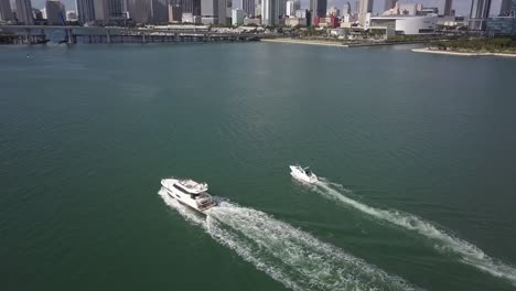 boats drifting by in downtown miami, florida