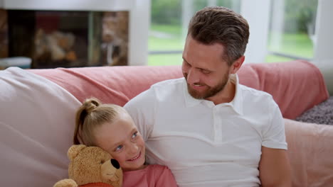 happy man talking with little girl