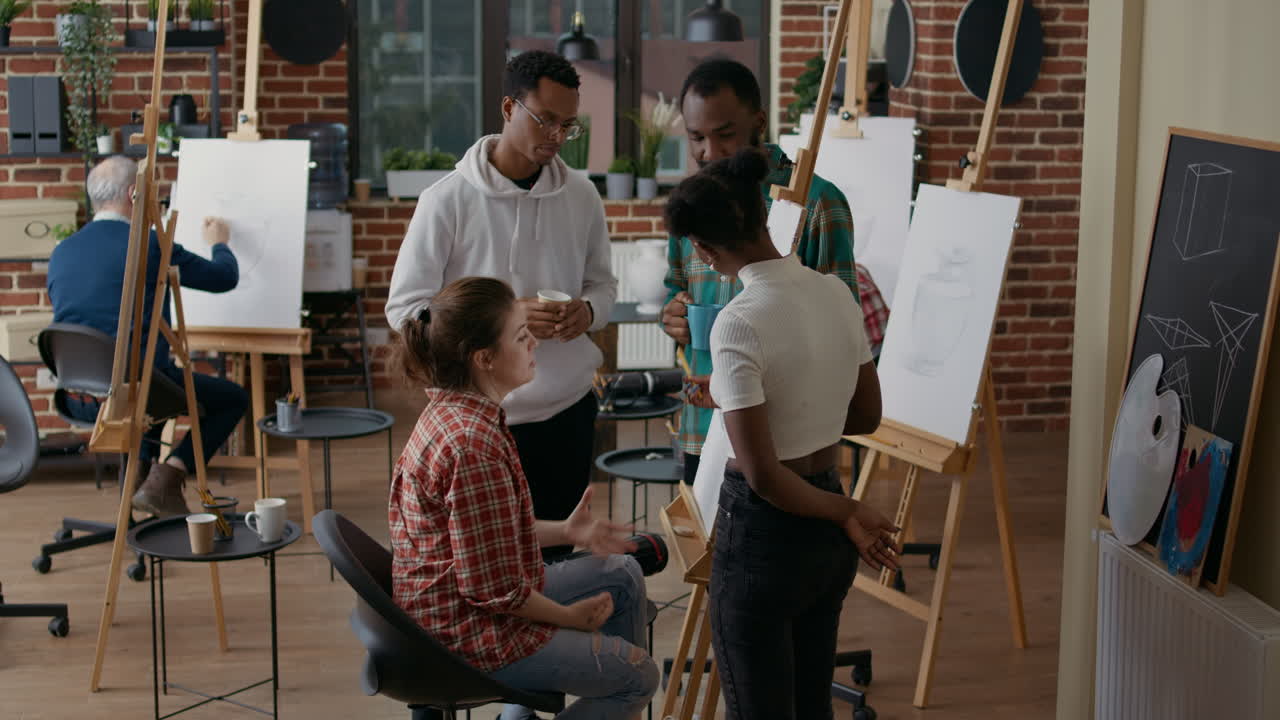 Multiethnic group of students learning to draw sketch together