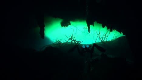 cave diver wraps the line and continues