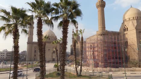 ongoing renovations at mosque-madrasa of sultan hassan and al-rifa'i mosque, cairo, egypt. panning shot