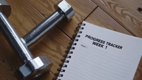 Dumbbells and Progress Tracker