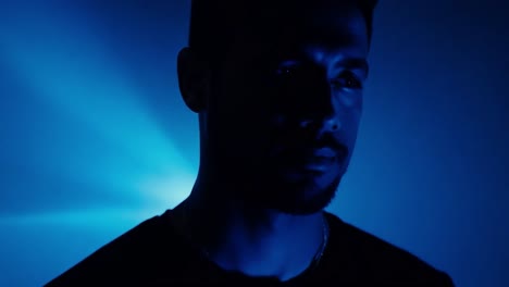 portrait of a man in blue light