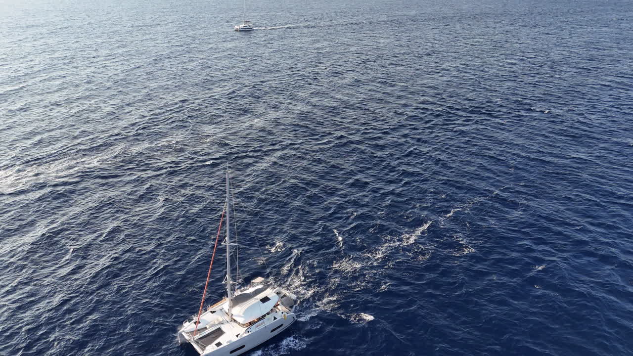 Aerial footage of a yacht sailing trip in the greek islands