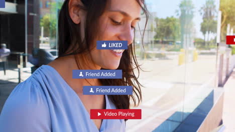 interacting with animation of social media notifications, woman smiling outdoors