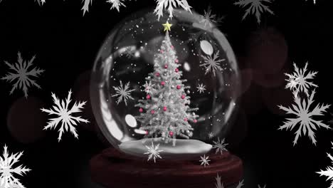 Animation-of-christmas-snowflakes-falling-over-snow-globe-with-tree-on-black-background