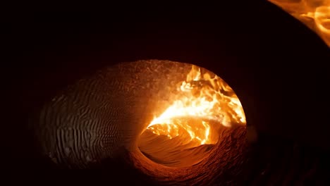 fire rages through a tunnel, creating a captivating display of heat and light amidst swirling smoke and intense flames