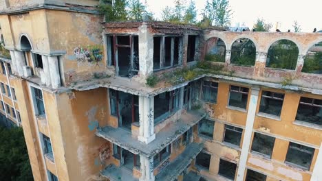 person in costume on top of a derelict building