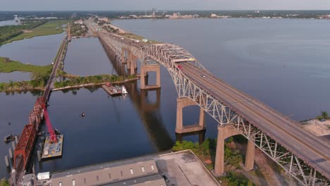 aerial of cars traveling over the calcasieu river bridge in lake charles, louisiana