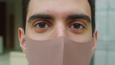 Portrait-of-Young-Man-in-Protective-Mask