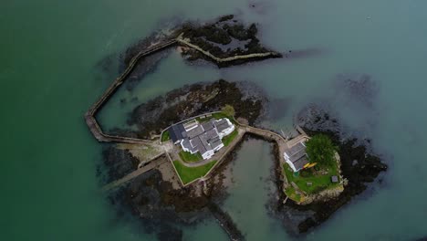 aerial view rising above swellies ynys gored goch houses on whitebait island welsh flowing menai straits anglesey