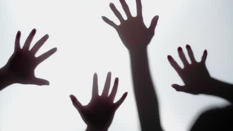 abstract and spooky defocused hand on white background
