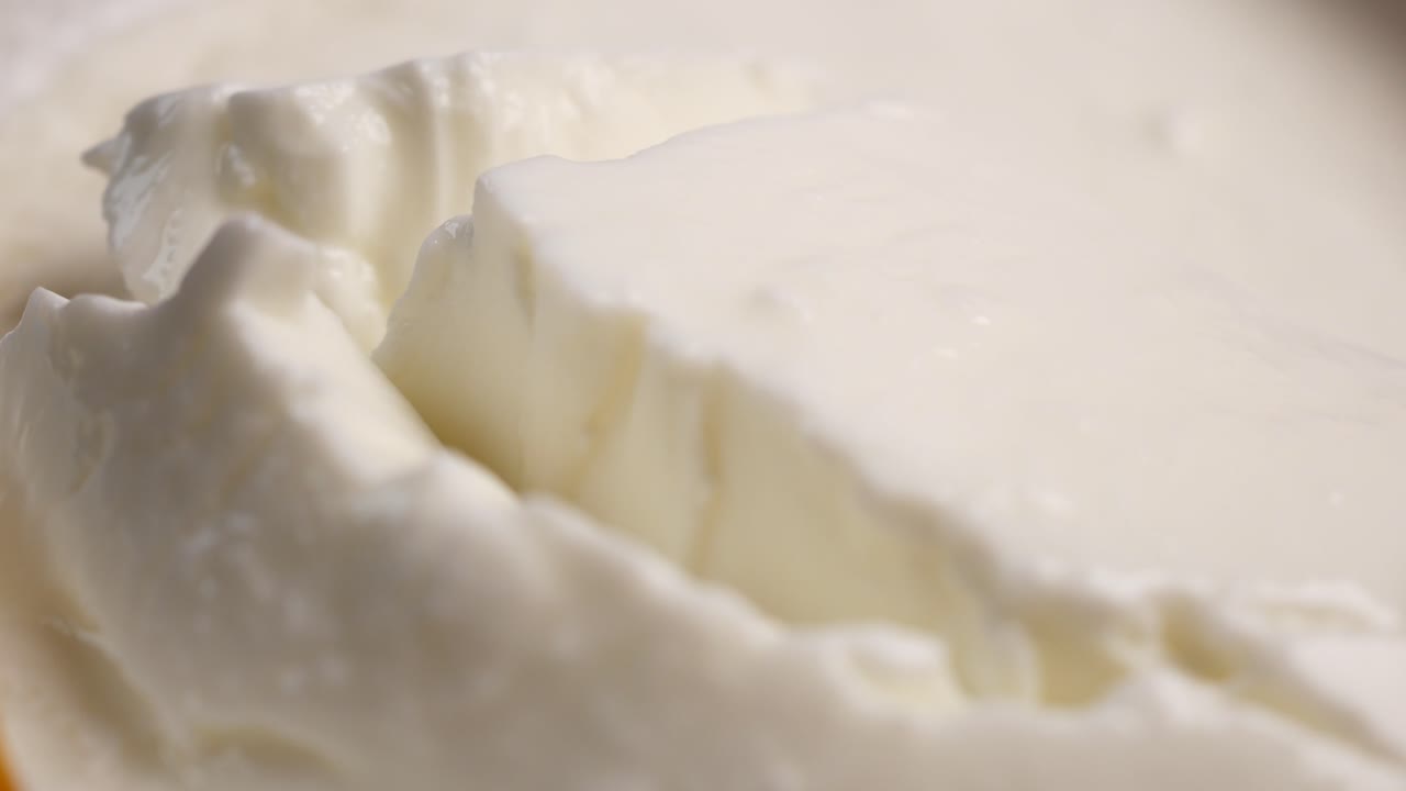 Primer plano de yogur blanco cremoso