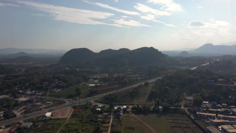 Aerial-drone-of-beautiful-mountains,-nature-and-scenic-landspace-of-Northern-Thailand-in-Chiang-Rai,-Thailand