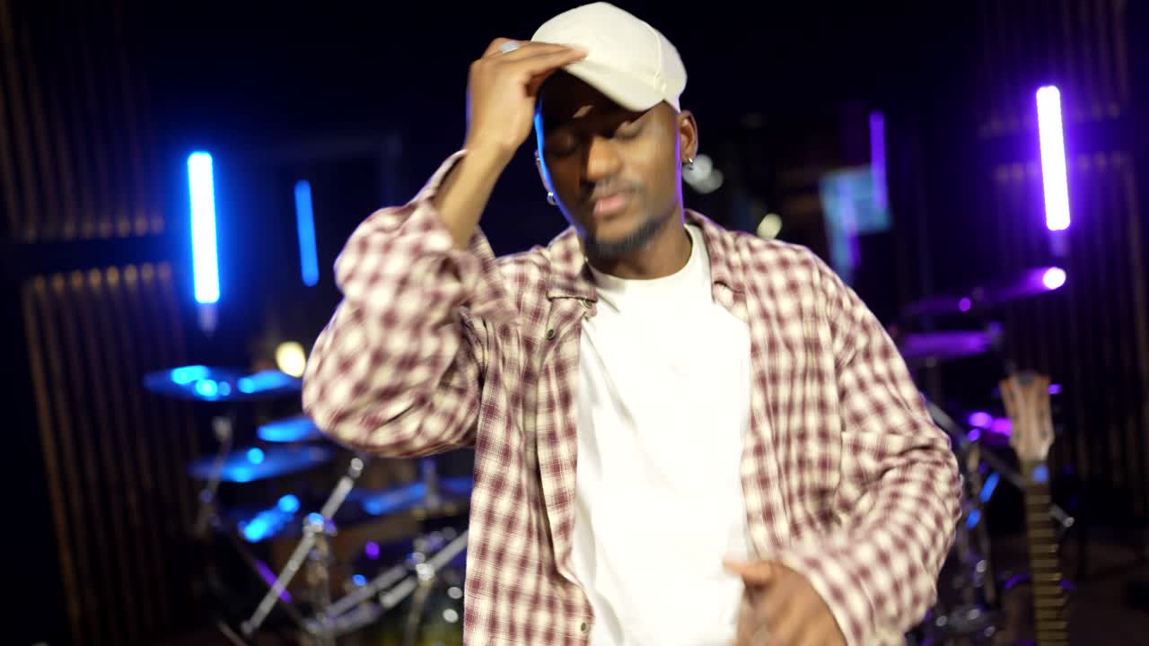 Man dancing in music studio