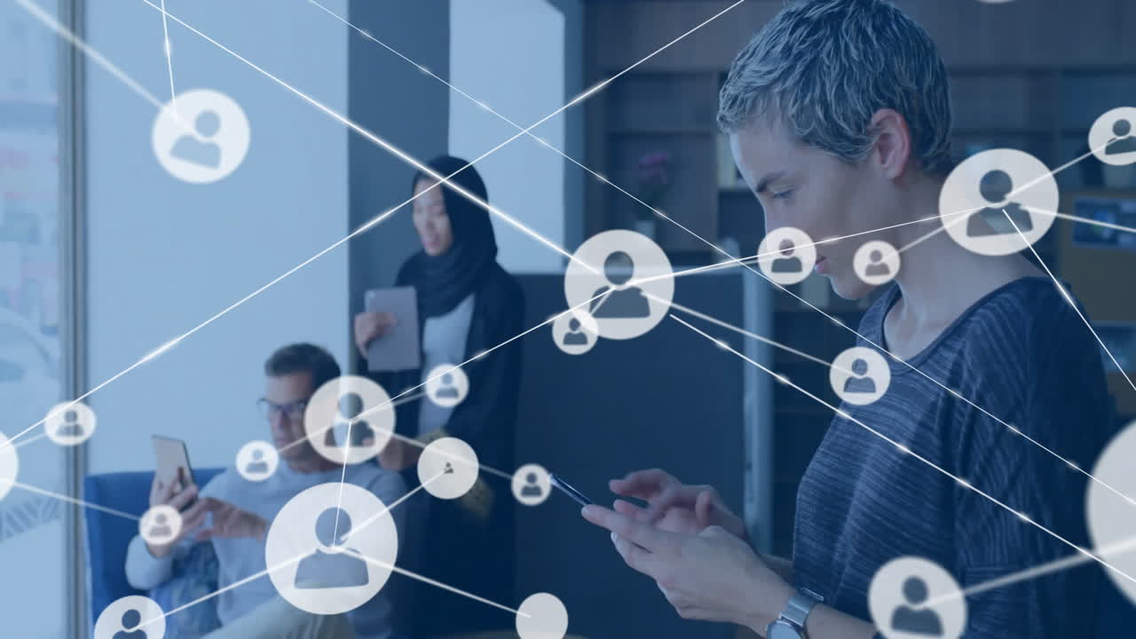 Animation of network of connections with people icons over diverse businesspeople using tablets