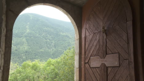wooden doorway with mountain view