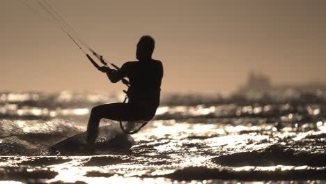 kiteboarding silhouette at sunset