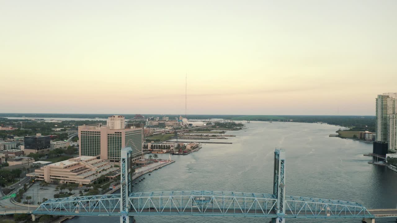 Drone shot revealing The Main Street Bridge that leads in and out of downtown Jacksonville