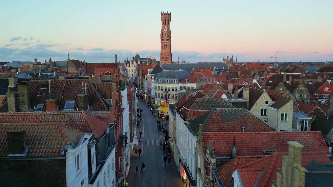 Bruges Cityscape at Sunset: Aerial View of Medieval Streets and Belfry