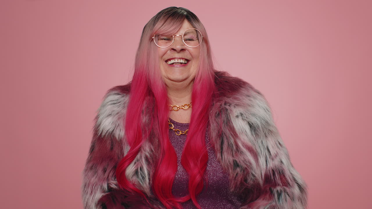 Joyful woman laughing out loud after hearing ridiculous anecdote, funny joke feeling carefree amused