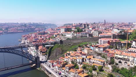 view of porto from douro river, luís i bridge, buildings and more