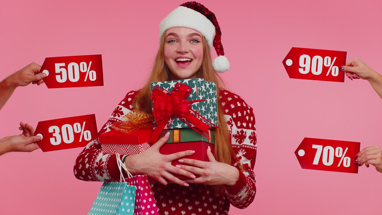 Girl holding gift boxes and receive christmas discounts inscriptions banner texts shopping sale