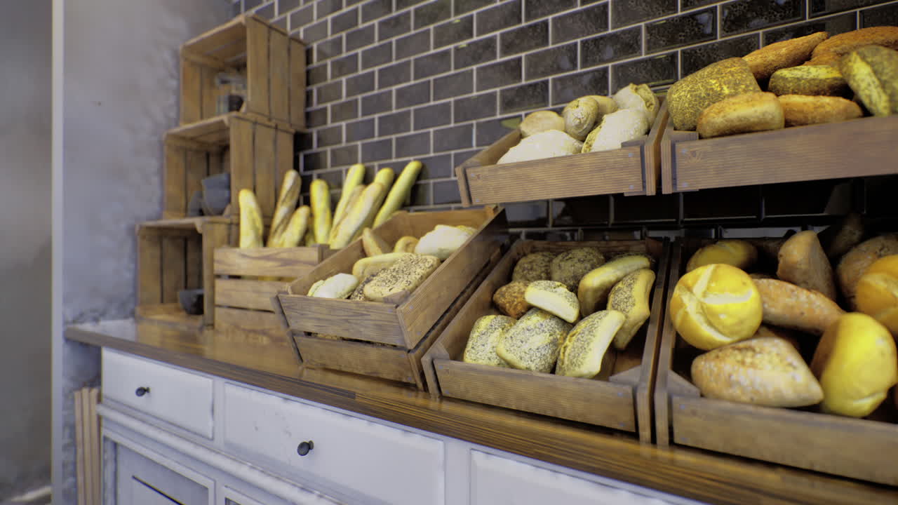 Artisan bakery display showcases an array of freshly baked breads and rolls