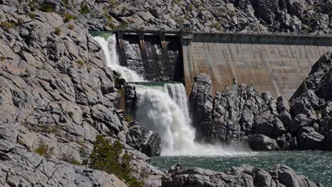 waterfall and dam at a reservoir