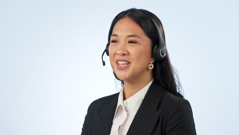 Asian-woman,-face-and-talking-in-call-center
