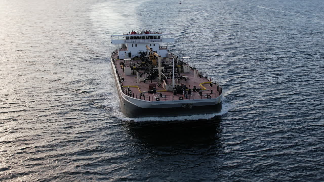 Premium stock video - Aerial around forward bow of tanker ship sailing ...