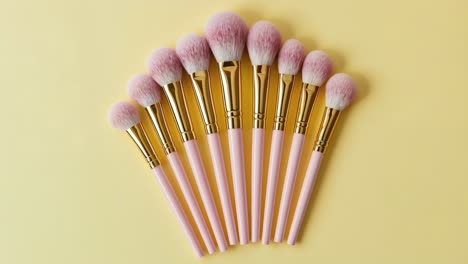 pink and gold makeup brushes