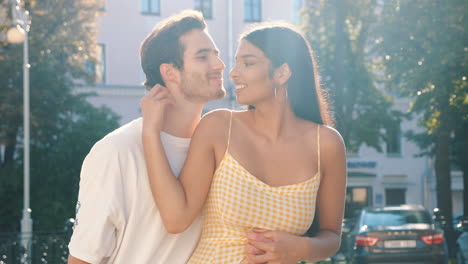 couple posing outdoors