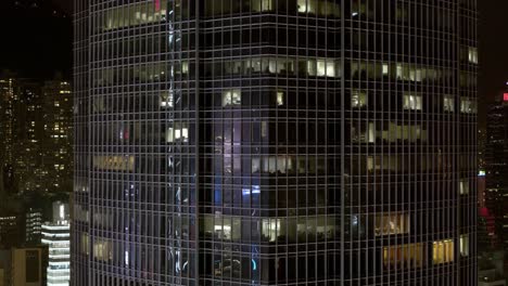 night view of a modern skyscraper in a city