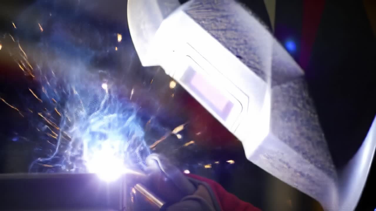 Dynamic Welding Process Captured: Intense Sparks and Bright Light Illuminate the Scene, Showcasing the Artistry and Precision Behind Metal Fabrication Techniques