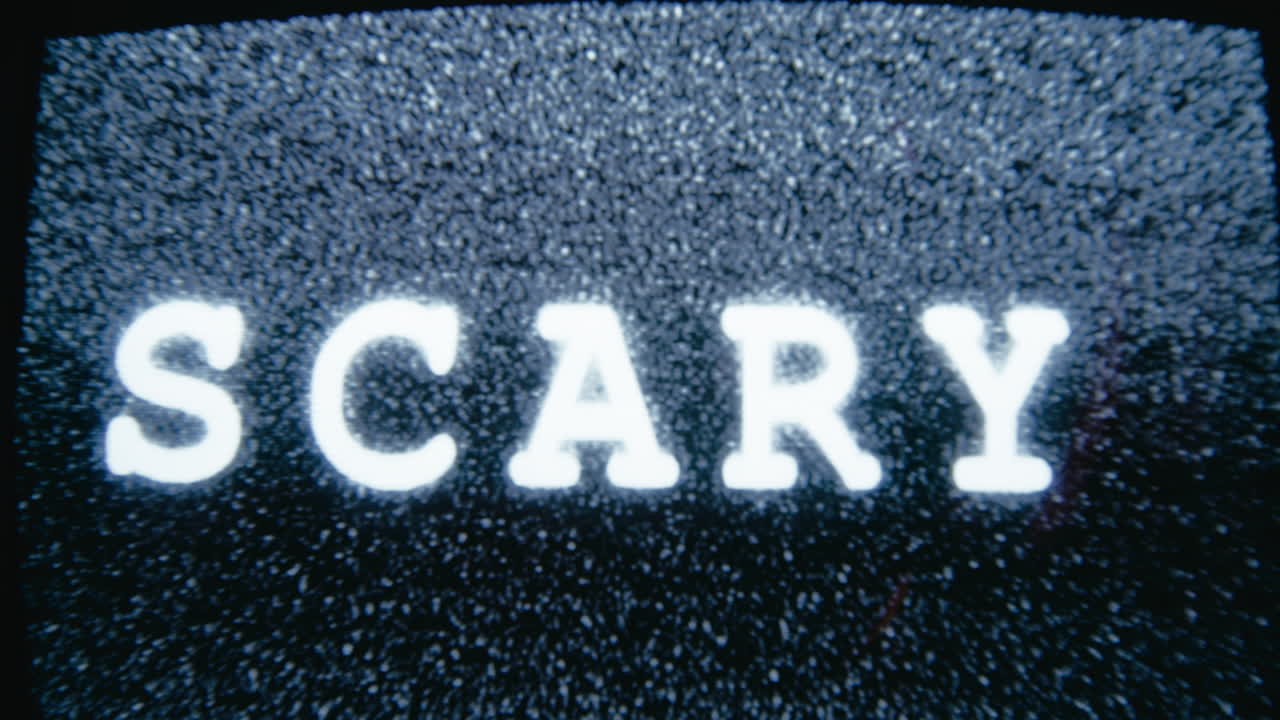 Scary Word Written on a Vintage Television with Horror Noise