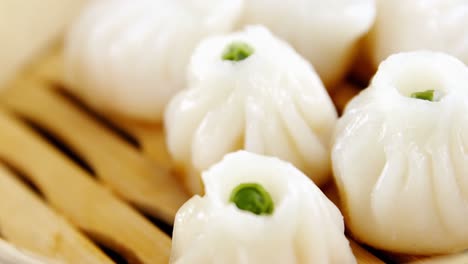 steamed dumplings in bamboo steamer