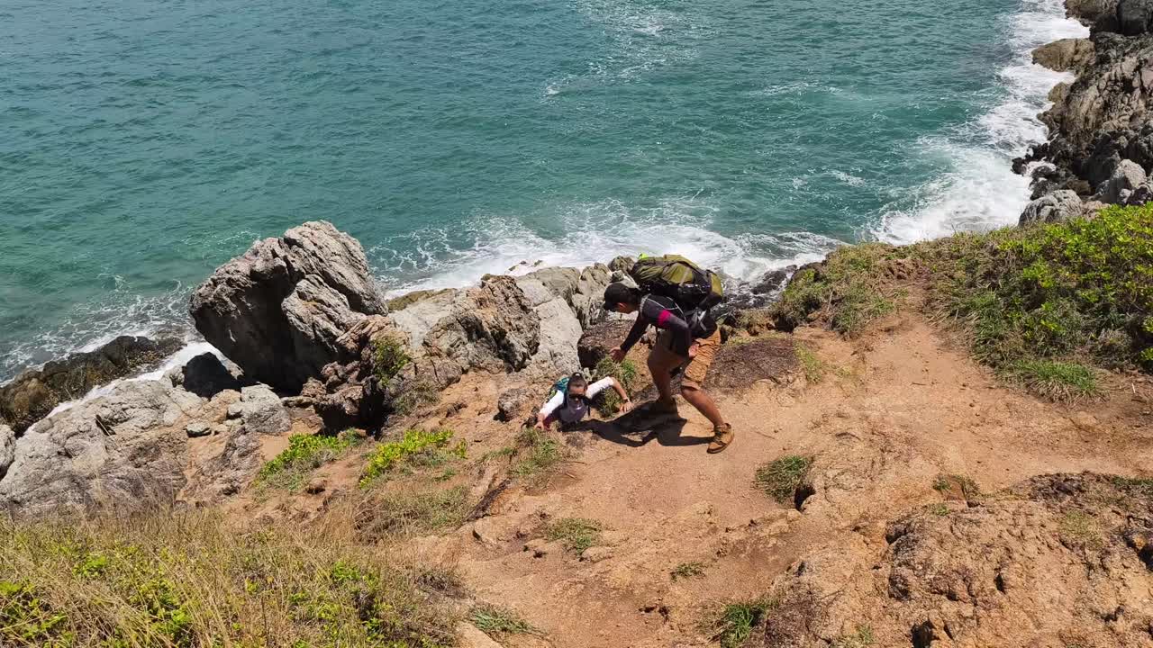 Family Hiking Adventure on Coastal Cliffs