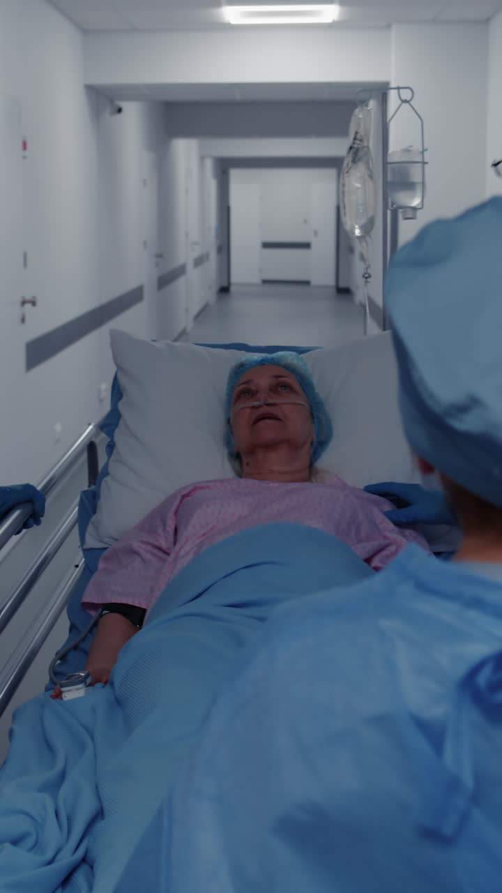 Doctors push stretcher with elderly patient 4k 2025 08 05 00 25 26 utc.mov | adult, african american, assistance, care