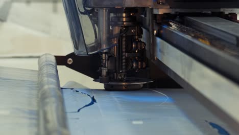 industrial fabric cutting machine. close up.4k