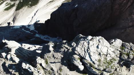 Hiker-approaching-a-high-mountain-ridge